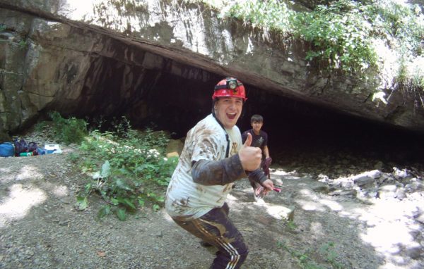 Cave adventure A muddy caver gives the camera a thumbs-up.